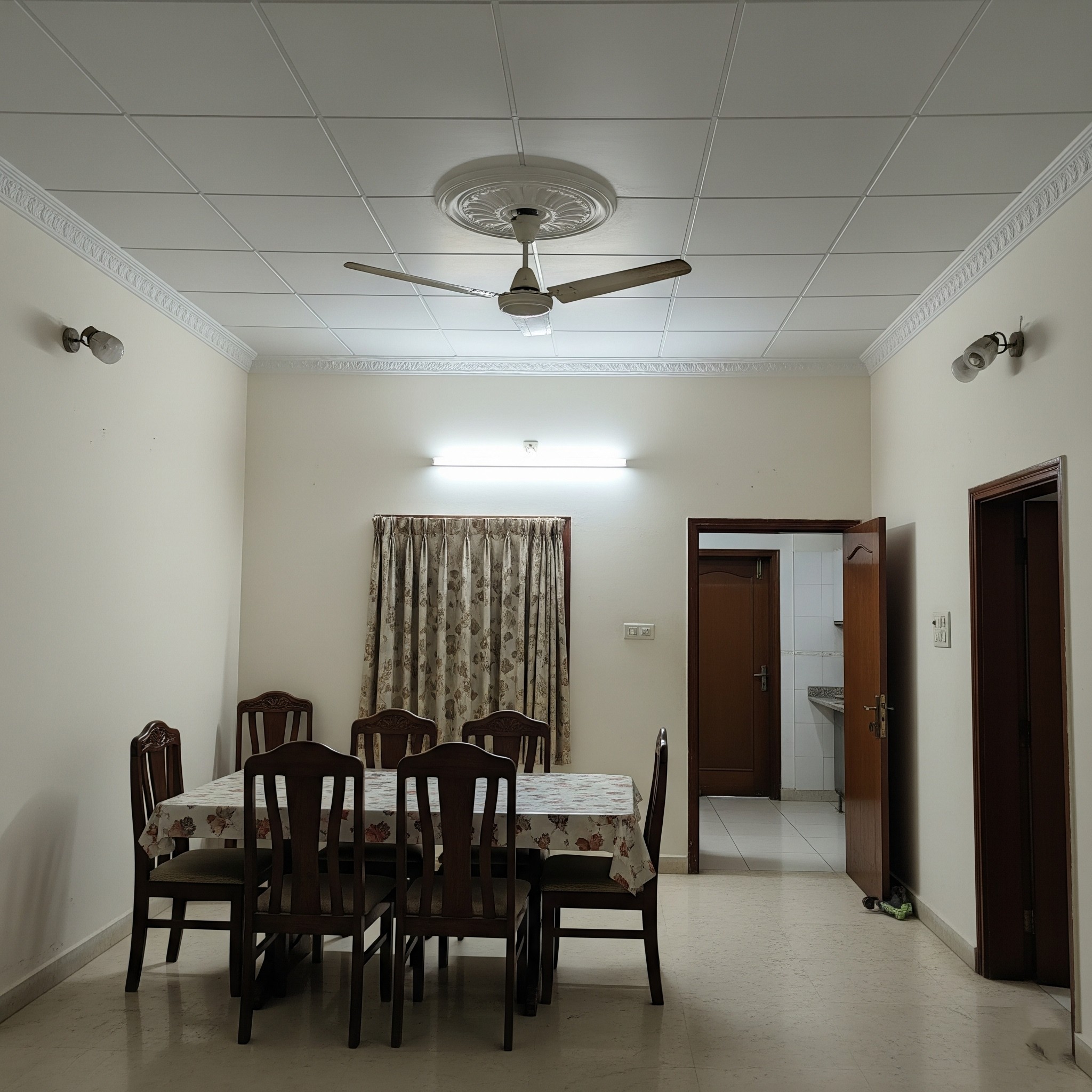 Before POP ceiling work: A basic ceiling lacking decorative elements.